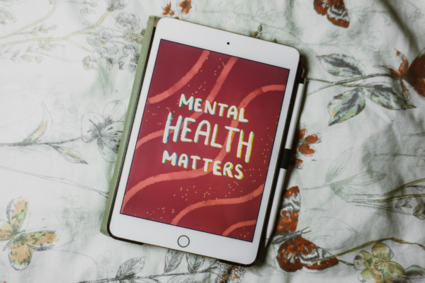 iPad on a sheet reading "Mental Health Matters!"